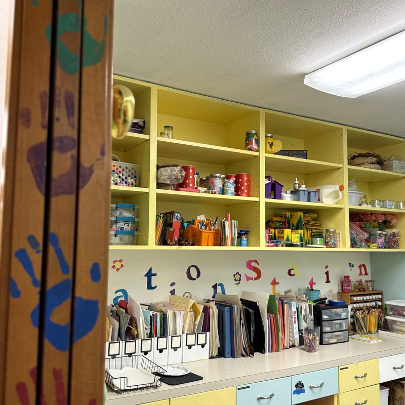 Shelves of art supplies in the art room